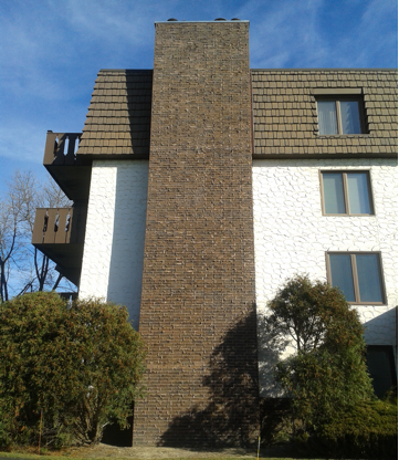 4 Story Chimney Rebuild From Capstone to Grade